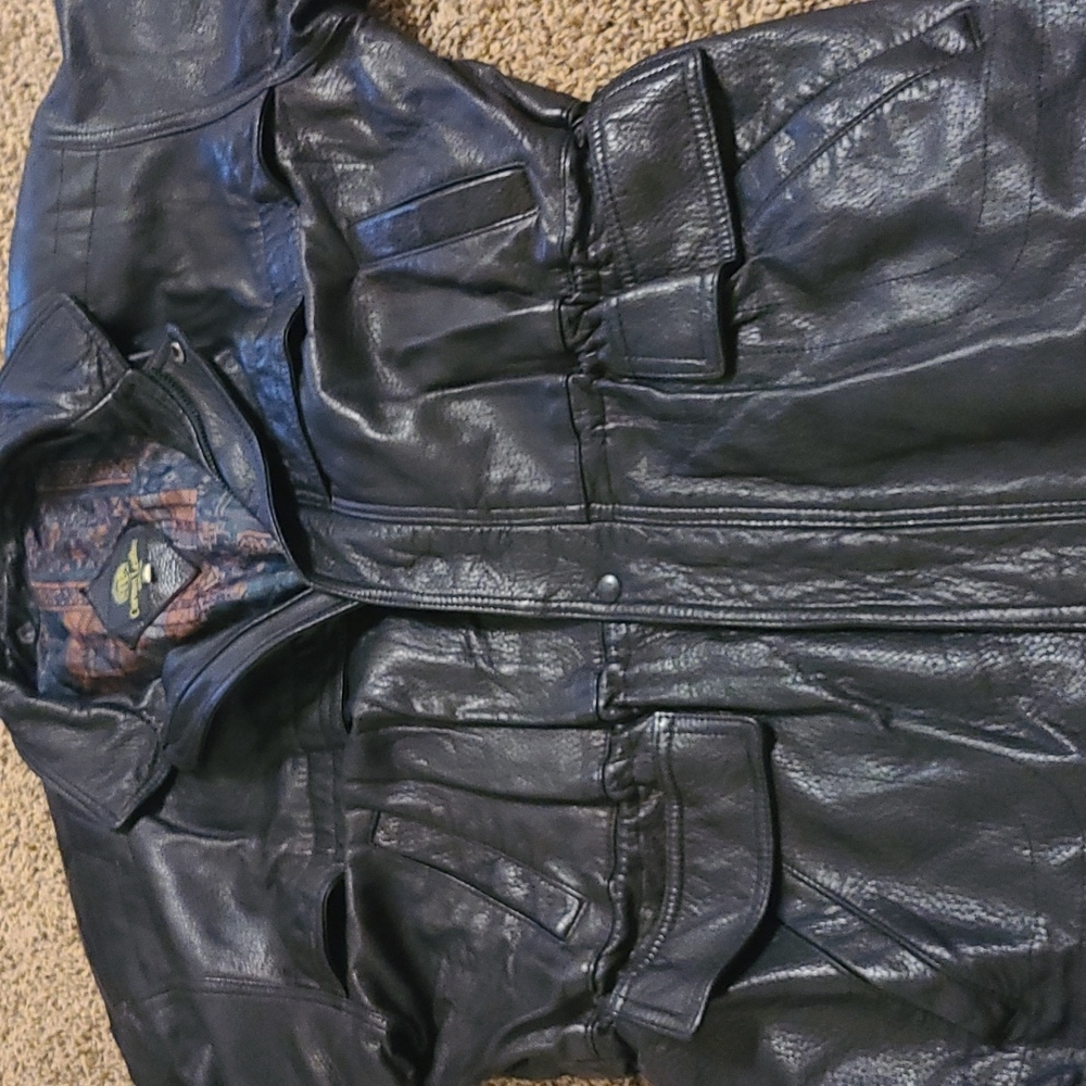 Hip length black leather jacket